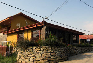 Approaching from Tilaran, one sees the office prominently situated alongside the Lake Arenal highway.